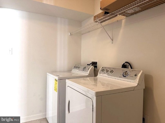 18 Kilgore Way, Bunker Hill, WV 25413 - laundry room featuring washer and clothes dryer and baseboards