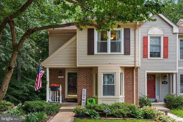 11590 Mohican Rd, Woodbridge, VA 22192 - townhome / multi-family property with brick siding