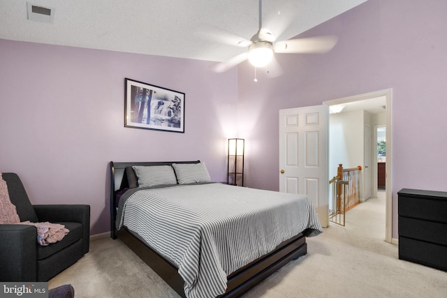 11590 Mohican Rd, Woodbridge, VA 22192 - bedroom with light colored carpet, high vaulted ceiling, and ceiling fan