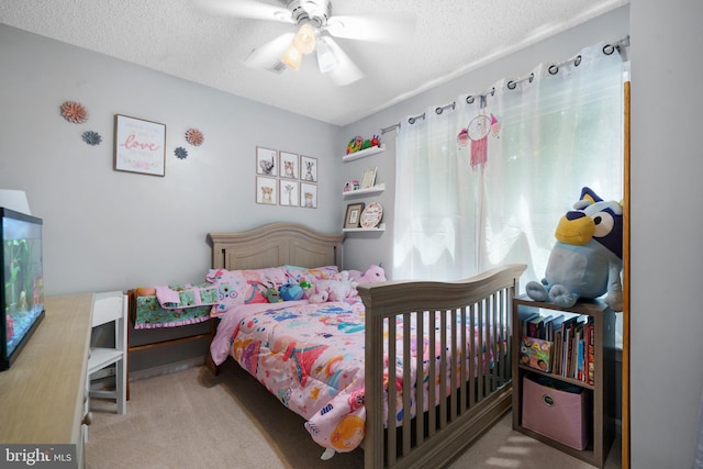 11590 Mohican Rd, Woodbridge, VA 22192 - bedroom featuring a textured ceiling, carpet floors, and ceiling fan