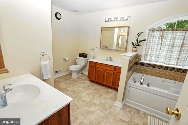 126 Fairbrook Dr, Gilbertsville, PA 19525 - bathroom with two vanities and a bath