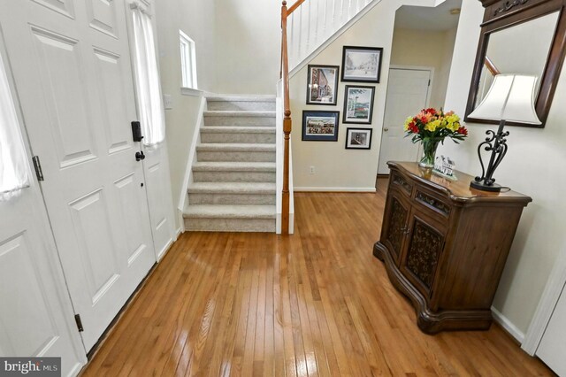 126 Fairbrook Dr, Gilbertsville, PA 19525 - entrance foyer with stairway and light wood finished floors
