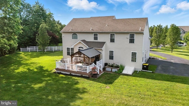 126 Fairbrook Dr, Gilbertsville, PA 19525 - rear view of property with a wooden deck and a shingled roof