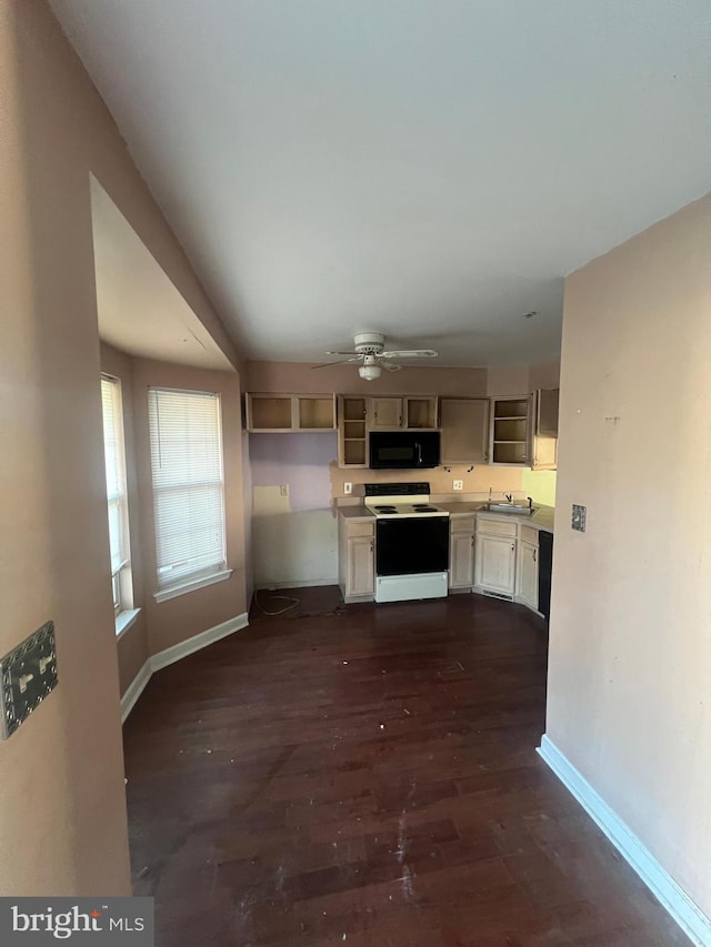 613 Buttonwoods Rd, Elkton, MD 21921 - kitchen with electric range, black microwave, dark wood-type flooring, ceiling fan, and open shelves