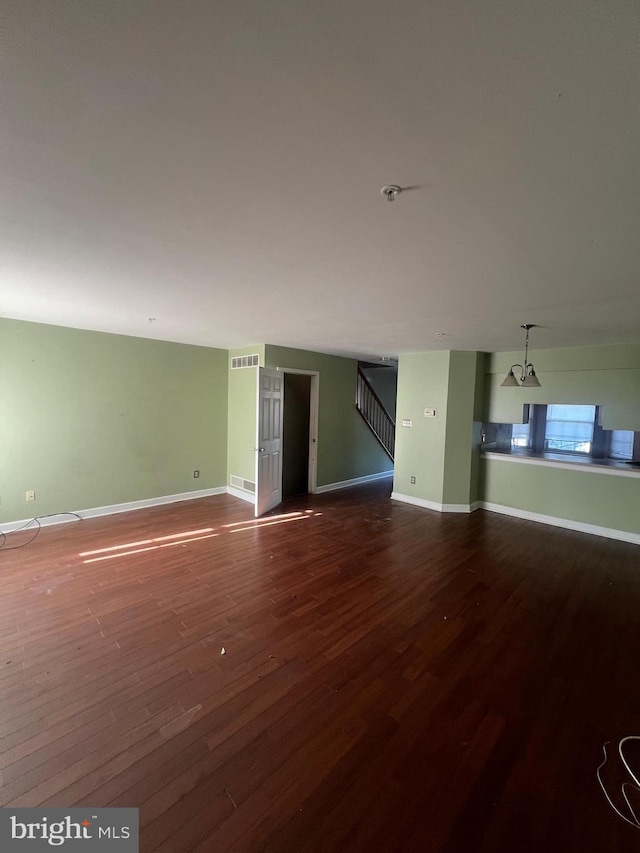 613 Buttonwoods Rd, Elkton, MD 21921 - unfurnished living room featuring wood finished floors and stairway