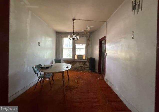 3953 Wilsby Ave, Baltimore, MD 21218 - dining space with a chandelier and baseboards