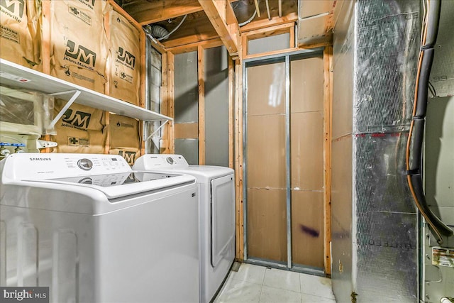 3189 Horseshoe Pike, Honey Brook, PA 19344 - laundry room featuring washing machine and dryer and heating unit