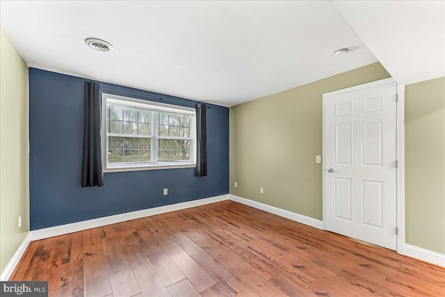 3189 Horseshoe Pike, Honey Brook, PA 19344 - spare room featuring hardwood / wood-style flooring and a smoke detector