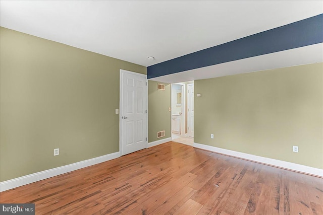3189 Horseshoe Pike, Honey Brook, PA 19344 - unfurnished room featuring wood finished floors and a smoke detector