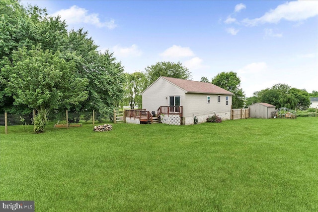 3189 Horseshoe Pike, Honey Brook, PA 19344 - back of property featuring a deck, a shed, a fenced backyard, and an outdoor fire pit