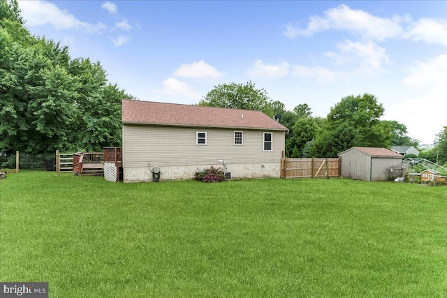 3189 Horseshoe Pike, Honey Brook, PA 19344 - back of house featuring a fenced backyard, a wooden deck, and a shed