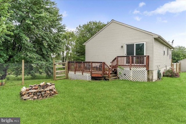 3189 Horseshoe Pike, Honey Brook, PA 19344 - rear view of house featuring a fire pit and a wooden deck