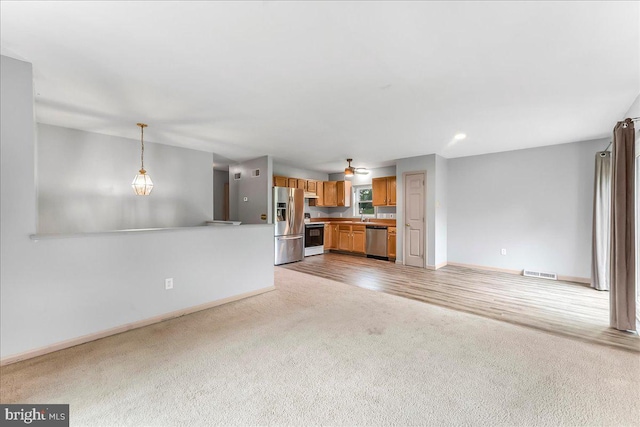 3189 Horseshoe Pike, Honey Brook, PA 19344 - unfurnished living room featuring light colored carpet and baseboards