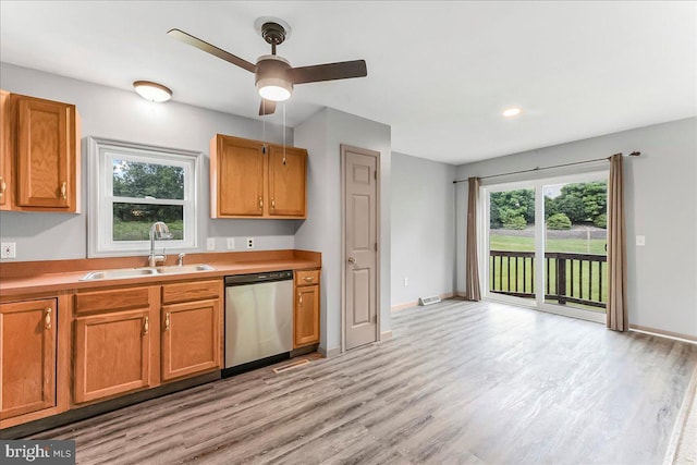 3189 Horseshoe Pike, Honey Brook, PA 19344 - kitchen with stainless steel dishwasher, light wood-type flooring, a ceiling fan, light countertops, and recessed lighting