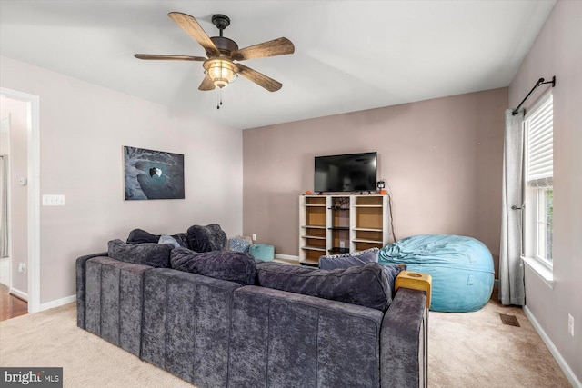 7 Kettlebrook Ct, Stafford, VA 22556 - carpeted living area with a ceiling fan and baseboards