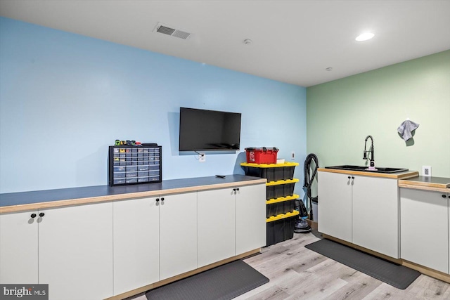 7 Kettlebrook Ct, Stafford, VA 22556 - misc room with light wood-style floors and recessed lighting
