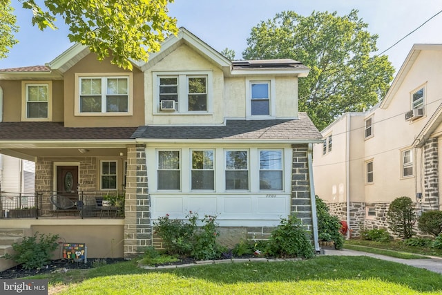 7701 Parkview Rd, Upper Darby, PA 19082 - view of front of house with stone siding, covered porch, stucco siding, and cooling unit