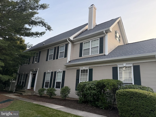 121 Coburn Rd, Pennington, NJ 08534 - view of front facade with a chimney and roof with shingles