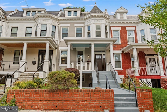 1425 Webster St NW, Washington, DC 20011 - view of property with a porch and brick siding