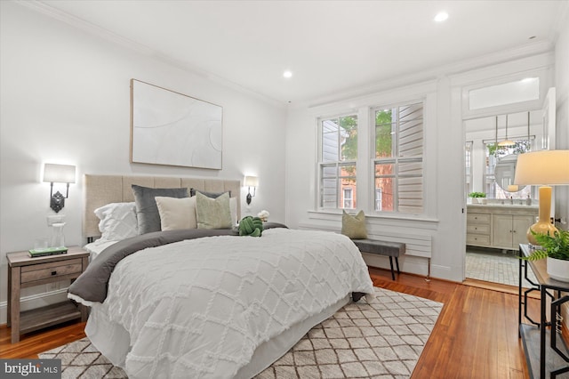 1425 Webster St NW, Washington, DC 20011 - bedroom featuring light wood-type flooring, ornamental molding, and recessed lighting