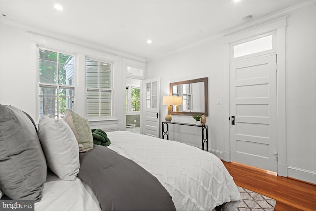 1425 Webster St NW, Washington, DC 20011 - bedroom with wood finished floors, crown molding, and recessed lighting