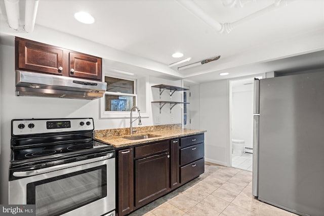 1425 Webster St NW, Washington, DC 20011 - kitchen with appliances with stainless steel finishes, under cabinet range hood, light tile patterned flooring, open shelves, and light stone countertops