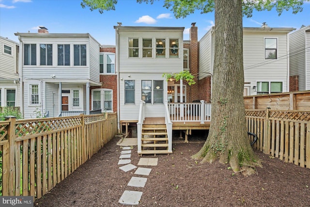1425 Webster St NW, Washington, DC 20011 - back of property featuring a deck and a fenced backyard