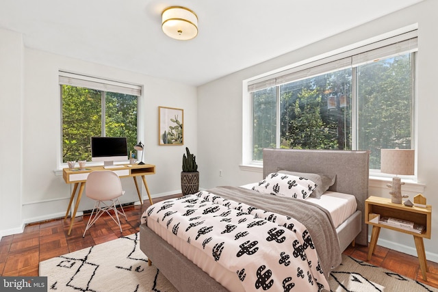 4100 W St NW Unit 306, Washington, DC 20007 - bedroom featuring multiple windows and a desk