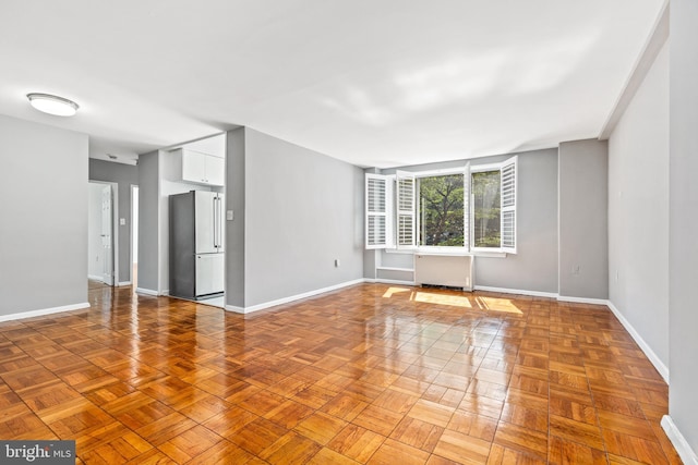 4100 W St NW Unit 306, Washington, DC 20007 - unfurnished room with baseboards and radiator