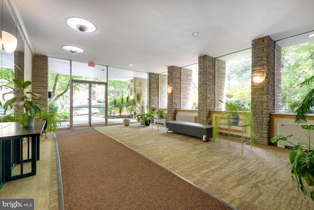 4100 W St NW Unit 306, Washington, DC 20007 - building lobby with a wall of windows