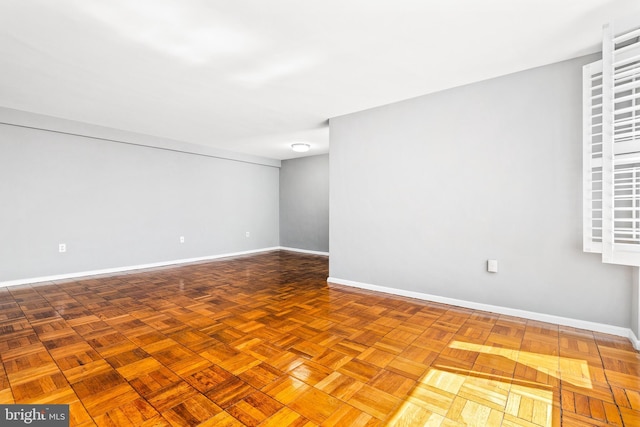 4100 W St NW Unit 306, Washington, DC 20007 - spare room featuring baseboards