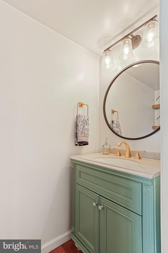 8535 Dark Hawk Cir, Columbia, MD 21045 - bathroom with vanity and wood finished floors