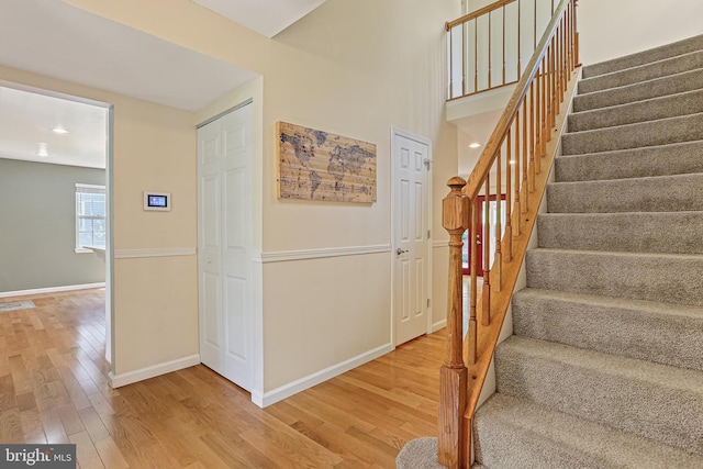 8535 Dark Hawk Cir, Columbia, MD 21045 - staircase featuring wood finished floors and baseboards