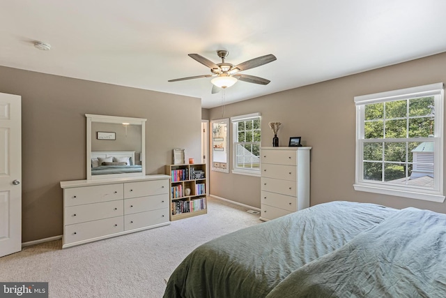 8535 Dark Hawk Cir, Columbia, MD 21045 - carpeted bedroom featuring baseboards and ceiling fan