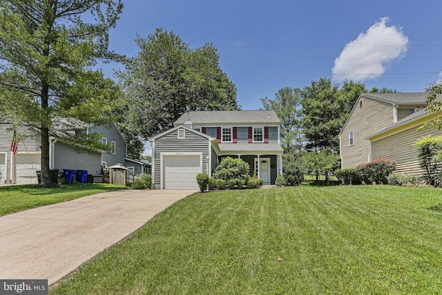 8535 Dark Hawk Cir, Columbia, MD 21045 - view of front facade with driveway, a front yard, and an attached garage