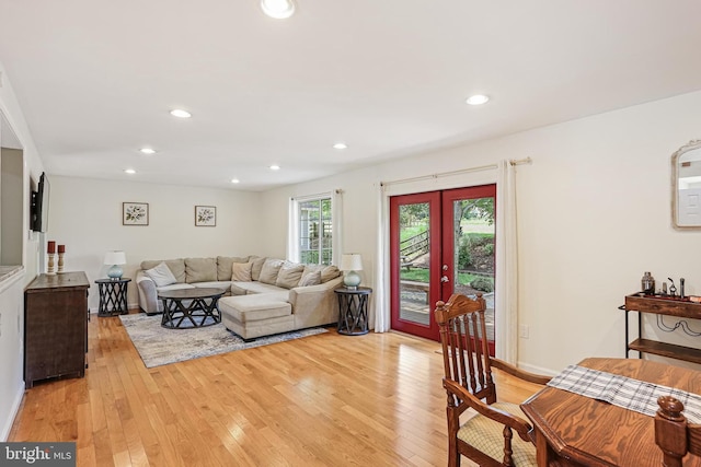 8535 Dark Hawk Cir, Columbia, MD 21045 - living room featuring light wood-type flooring, recessed lighting, and french doors