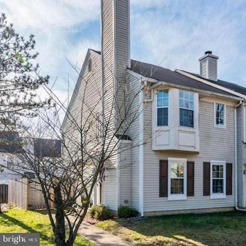 8694 Venoy Ct, Alexandria, VA 22309 - view of side of home featuring a chimney
