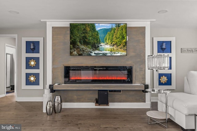 1039 Clinton Ave, Bensalem, PA 19020 - living room with a glass covered fireplace and wood finished floors