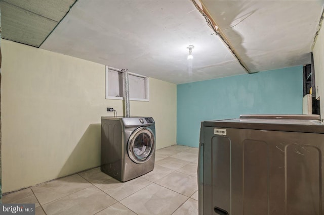 1039 Clinton Ave, Bensalem, PA 19020 - laundry room featuring washer and dryer and light tile patterned floors
