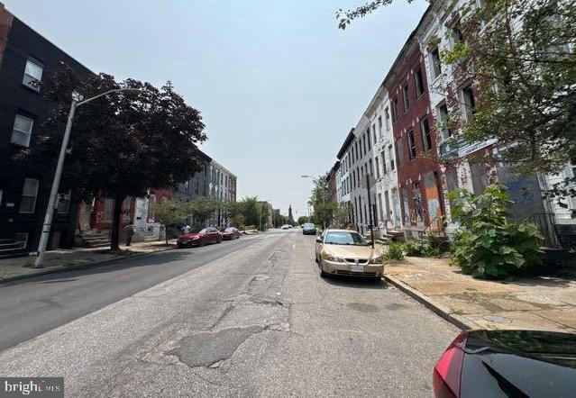 324 Fulton Ave, Baltimore, MD 21223 - view of street featuring street lights, sidewalks, and curbs