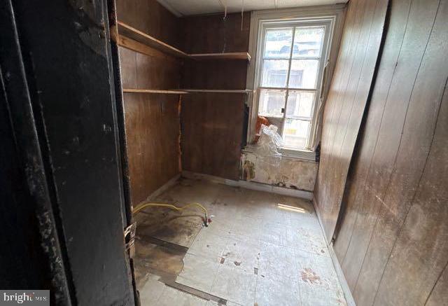 324 Fulton Ave, Baltimore, MD 21223 - miscellaneous room with wooden walls