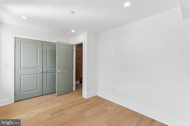 2165 E Gordon St, Philadelphia, PA 19125 - unfurnished bedroom with light wood-style floors, a closet, and recessed lighting