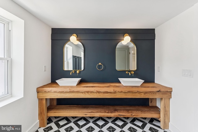 2165 E Gordon St, Philadelphia, PA 19125 - bathroom with double vanity and baseboards