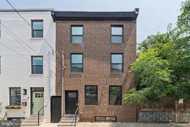 2165 E Gordon St, Philadelphia, PA 19125 - view of property featuring entry steps and brick siding