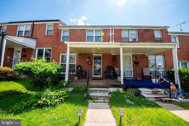 5563 Cedonia Ave, Baltimore, MD 21206 - multi unit property featuring brick siding and a porch