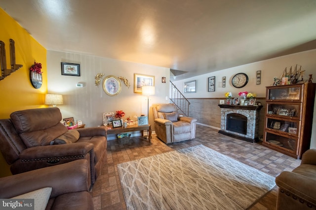 5563 Cedonia Ave, Baltimore, MD 21206 - living area with stairway and a stone fireplace