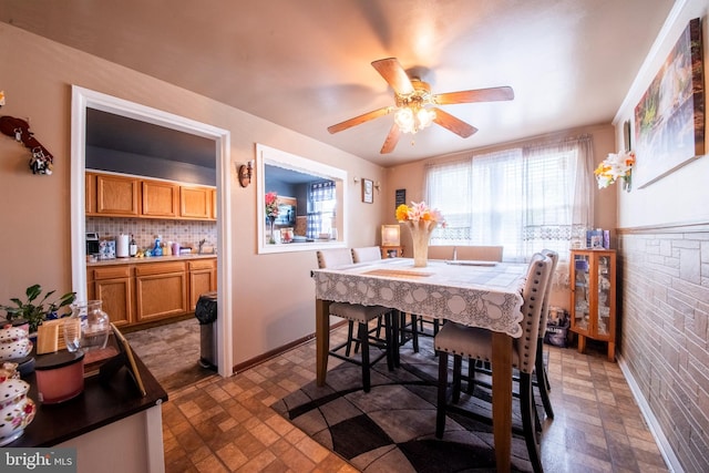 5563 Cedonia Ave, Baltimore, MD 21206 - dining area featuring ceiling fan and brick patterned flooring
