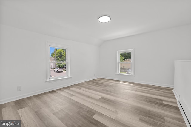 310 Elizabeth St, Middletown, DE 19709 - empty room with light wood-type flooring and lofted ceiling