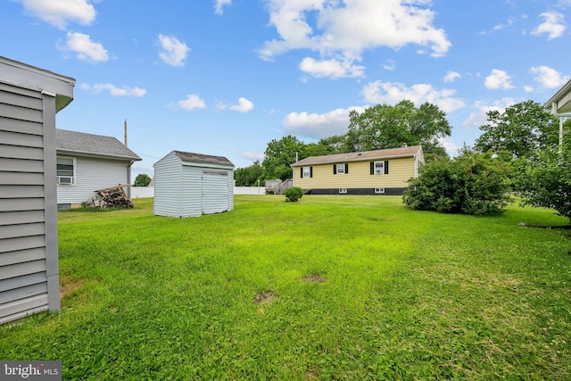 310 Elizabeth St, Middletown, DE 19709 - view of green lawn featuring a storage shed
