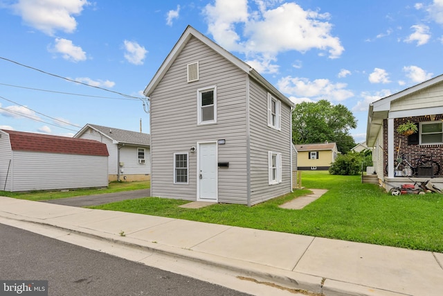 310 Elizabeth St, Middletown, DE 19709 - view of front of home with a front lawn and an outbuilding